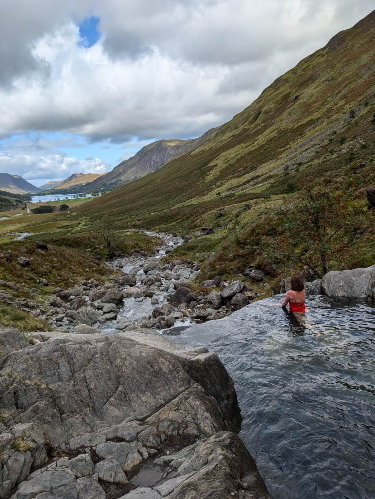 view from Buttermere infinity pool looking down towards the lake